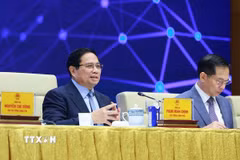 Thủ tướng Phạm Minh Chính chủ trì Diễn đàn Quốc gia phát triển kinh tế số và xã hội số lần thứ 3. (Ảnh: Dương Giang/TTXVN)
