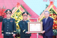 Tổng Bí thư Tô Lâm trao Huân chương Hồ Chí Minh cho lực lượng Tình báo Quốc phòng Việt Nam. (Ảnh: Thống Nhất/TTXVN)