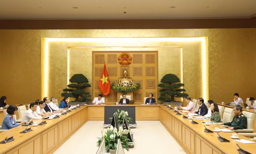 Phó Thủ tướng Vũ Ðức Ðam chủ trì cuộc họp. (Ảnh: Văn Điệp/TTXVN)