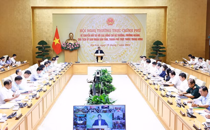 Thủ tướng Phạm Minh Chính chủ trì hội nghị Thường trực Chính phủ với các bộ, ngành, địa phương về chuyển đổi số. (Ảnh: Dương Giang/TTXVN)