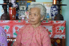 Bà Nguyễn Thị Lệ đã được Nhà nước công nhận là vợ liệt sỹ Huỳnh Văn Quên sau 58 năm chờ đợi. (Ảnh: Đức Hạnh/TTXVN)