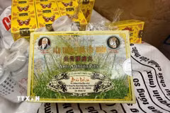Các sản phẩm thuốc đông y giả của nhóm đối tượng sản xuất. (Ảnh: TTXVN phát)