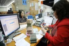 Kiên quyết cưỡng chế, xử lý thu hồi nợ đối với các doanh nghiệp "chây ỳ". (Ảnh minh họa: TTXVN)