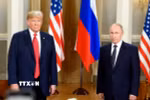 Tổng thống Nga Vladimir Putin (phải) và Tổng thống Mỹ Donald Trump. (Ảnh: THX/TTXVN)