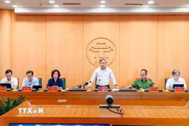 Chủ tịch Ủy ban Nhân dân thành phố Hà Nội Vũ Đại Thắng phát biểu tại Hội nghị. (Ảnh: Trung Nguyên/TTXVN)