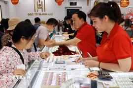 Mua, bán vàng tại Công ty Vàng Bảo Tính Mạnh Hải (ảnh tư liệu). (Ảnh: Trần Việt/TTXVN)
