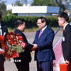 Lễ đón Thủ tướng Phạm Minh Chính đến Thủ đô Vientiane đồng chủ trì Kỳ họp lần thứ 48 Ủy ban liên Chính phủ Việt Nam-Lào. (Ảnh: Dương Giang/TTXVN)