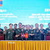 Ban Chỉ huy Bộ đội Biên phòng tỉnh Nghệ An (Việt Nam) ký Bản ghi nhớ với Bộ Chỉ huy Quân sự các tỉnh Xiengkhuang, Bolikhamsai, Houaphan (Lào). (Ảnh: Văn Tý/TTXVN)
