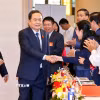 Chủ tịch Quốc hội Trần Thanh Mẫn và đại biểu dự Đại hội đại biểu Đảng bộ Văn phòng Quốc hội lần thứ 15. (Ảnh: Doãn Tấn/TTXVN)