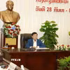Tổng Bí thư, Chủ tịch nước Lào Thongloun Sisoulith chủ trì Hội nghị bất thường Ban Chấp hành Trung ương Đảng Nhân dân Cách mạng Lào khóa XII. (Ảnh: Xuân Tú/TTXVN)