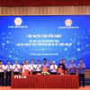 Lễ bàn giao Bộ học liệu đa phương tiện "Bình dân học vụ số." (Ảnh: Tuấn Anh/TTXVN)