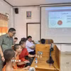 Các thí sinh thực hiện phần thi. (Ảnh: TTXVN phát)