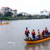 Lực lượng chức năng và Đội Cứu hộ 116 tìm kiếm quân nhân và nạn nhân mất tích. (Ảnh: Đinh Văn Nhiều/TTXVN)