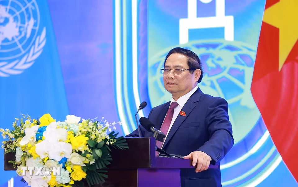 Thủ tướng Phạm Minh Chính phát biểu tại cuộc gặp gỡ báo chí Lễ mở ký và Hội nghị cấp cao Công ước của Liên hợp quốc về chống tội phạm mạng. (Ảnh: Dương Giang/TTXVN)