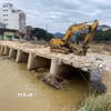 Ngày 22/10, cây cầu ngầm bắc qua Sông Hiến, phương Thục Phán, tỉnh Cao Bằng chính thức bị dỡ bỏ. (Ảnh: Quốc Đạt/TTXVN)
