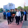 Hài cốt liệt sỹ được trang trọng đưa về nơi an nghỉ tại Nghĩa trang Liệt sỹ xã Sơn Lương. (Ảnh: Tạ Toàn/TTXVN)