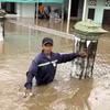 Nhiều nhà dân ở xã Hàm Thuận Bắc (tỉnh Lâm Đồng) bị ngập sâu. (Ảnh: Hồng Hiếu/TTXVN)