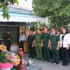 Đại biểu thực hiện nghi thức tâm linh trước khi tổ chức khai quật, tìm kiếm, quy tập hài cốt liệt sỹ. (Ảnh: Lê Thúy Hằng/TTXVN)