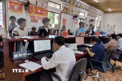 Trung tâm Phục vụ hành chính công xã Tủa Sín Chải, tỉnh Lai Châu, nhanh chóng trở thành địa chỉ quen thuộc, gần gũi của người dân trên địa bàn mỗi khi cần giải quyết các thủ tục hành chính. (Ảnh: Việt Dũng/TTXVN)