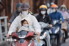 Nhiệt độ tại Hà Nội thấp nhất từ 13-15 độ, cao nhất 20-22 độ C. (Ảnh: Minh Quyết/TTXVN)