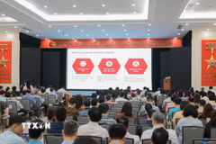 Đảng viên Đảng bộ TTXVN dự hội nghị trực tuyến tại điểm cầu trụ sở Thông tấn quốc gia (số 5, Lý Thường Kiệt). (Ảnh: Phan Phương/TTXVN)