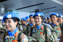 Niềm vui và tự hào của chiến sỹ Đội Công binh số 4 khi lên đường thực hiện nhiệm vụ gìn giữ hòa bình. (Ảnh: Tuấn Anh/TTXVN)