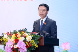 Đồng chí Nguyễn Mạnh Hùng, Ủy viên Trung ương Đảng, Bộ trưởng Bộ Khoa học và Công nghệ trả lời câu hỏi của phóng viên các cơ quan thông tấn, báo chí. (Ảnh: Phạm Kiên/TTXVN)