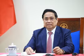 Thủ tướng Phạm Minh Chính điện đàm với Tổng thống Angola João Manuel Gonçalves Lourenço. (Ảnh: Dương Giang/TTXVN)