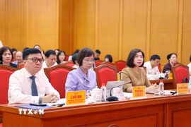 Tổng giám đốc TTXVN Vũ Việt Trang (giữa) tham dự Hội thảo. (Ảnh: Vũ Hoàng Giang/TTXVN)