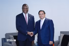 Thủ tướng Phạm Minh Chính gặp Phó Tổng thống Nam Phi Paul Mashatile. (Ảnh: Dương Giang/TTXVN)