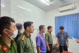 Cơ quan An ninh điều tra CATP. Hà Nội thi hành lệnh bắt, khám xét khẩn cấp nơi làm việc của ông Hà Huy Dũng ngày 17/6/2024. (Ảnh TTXVN phát)