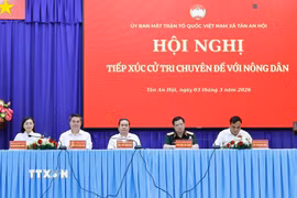 Chủ tịch Quốc hội Trần Thanh Mẫn dự Hội nghị tiếp xúc cử tri chuyên đề với nông dân tại xã Tân An Hội, Thành phố Hồ Chí Minh.(Ảnh: Doãn Tấn/TTXVN)