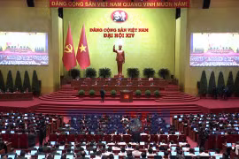 Đồng chí Trần Hồng Minh, Ủy viên Trung ương Đảng, Bí thư Đảng ủy, Bộ trưởng Bộ Xây dựng, tham luận về vấn đề “Đột phá mạnh mẽ phát triển kết cấu hạ tầng trong kỷ nguyên mới”. (Ảnh: TTXVN)