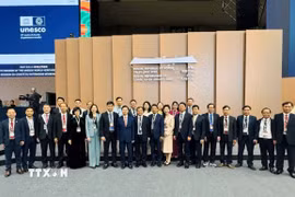 Đoàn Việt Nam tại Kỳ họp lần thứ 48 Uỷ ban Di sản thế giới thuộc Tổ chức Giáo dục, khoa học và văn hóa Liên hợp quốc (UNESCO) tổ chức tại thành phố Busan. (Ảnh: Khánh Vân/TTXVN)