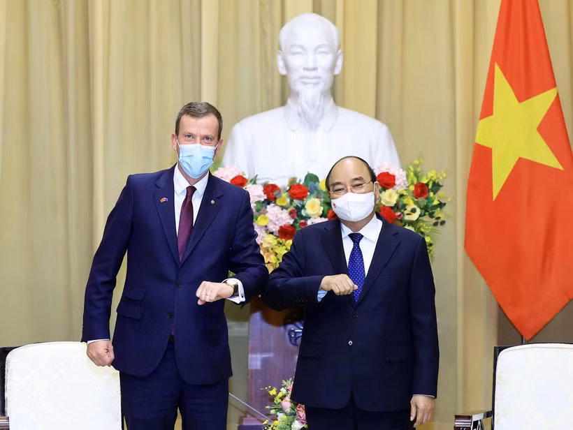 Chủ tịch nước Nguyễn Xuân Phúc tiếp Bộ trưởng Thương mại, Du lịch và Đầu tư Australia Dan Tehan. (Ảnh: Thống Nhất/TTXVN)