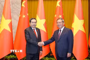 Chủ tịch Quốc hội Trần Thanh Mẫn hội kiến Thủ tướng Trung Quốc Lý Cường. (Ảnh: Doãn Tấn/TTXVN)