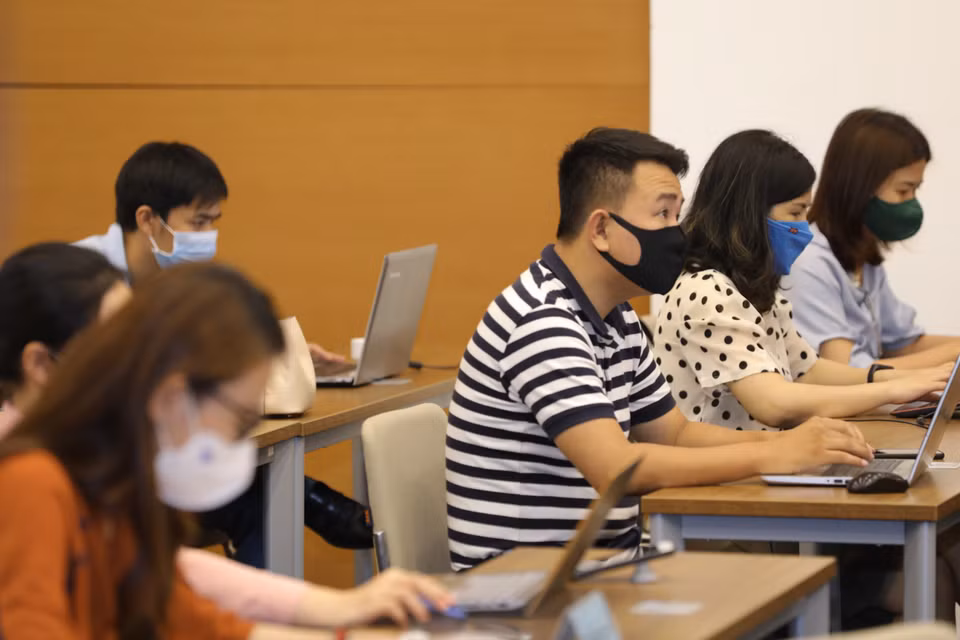 Phóng viên tác nghiệp tại buổi họp báo. (Ảnh: Nguyễn Điệp/TTXVN)