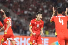 Niềm vui của các cầu thủ U23 Việt Nam. (Ảnh: TTXVN phát)