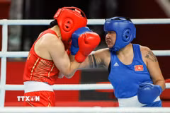Võ sỹ boxing Lưu Diễm Quỳnh sẽ gặp võ sỹ Trung Quốc ở bán kết ASIAD 2026. (Ảnh: Hoàng Linh/TTXVN)
