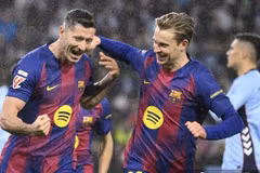Robert Lewandowski tỏa sáng giúp Barcelona thu hẹp khoảng cách với Real Madrid. (Nguồn: AFP)