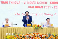 Thủ tướng Phạm Minh Chính chủ trì Hội nghị toàn quốc tổng kết Chương trình mục tiêu quốc gia xây dựng nông thôn mới. (Ảnh: Dương Giang/TTXVN)