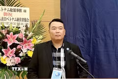 Ông Nguyễn Vũ Minh Hoàng, Tổng Thư ký Hội Liên lạc người Việt Nam ở nước ngoài Thành phố Hồ Chí Minh đề xuất giải pháp đưa Nghị quyết 23 đi vào cuộc sống. (Ảnh: Xuân Khu/TTXVN)