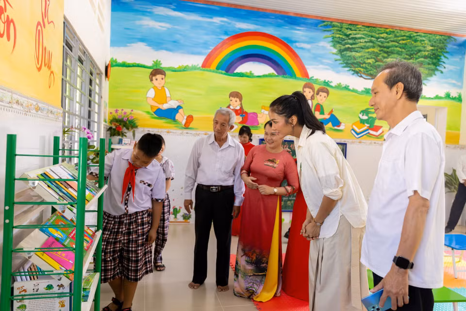 Vẫn như 11 thư viện thân thiện trước, thư viện thân thiện thứ 12 tại Đồng Nai đảm bảo không gian thư viện được trang trí bằng những hình vẽ hoạt hình màu sắc. (Ảnh: CTV/Vietnam+)