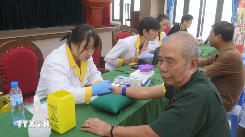 ttxvn_lao-cai-to-chuc-thu-nhan-mau-adn-than-nhan-liet-si-chua-xac-dinh-duoc-danh-tinh-dot-3.jpg