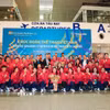 Đoàn thể thao Việt Nam tại sân bay quốc tế Nội Bài, sáng 7/12. (Ảnh: TTXVN phát)