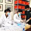 Nơi tiếp nhận, kiểm tra mẫu sinh phẩm hài cốt liệt sỹ tại Trung tâm Giám định ADN thuộc Viện Sinh học (Viện Hàn lâm Khoa học và Công nghệ Việt Nam). (Ảnh: An Đăng/TTXVN)