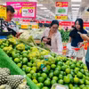 Mua sắm tại siêu thị. (Ảnh minh họa. Hương Giang/TTXVN)
