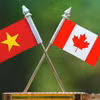 Quốc kỳ Việt Nam và Quốc kỳ Canada.