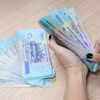 Thêm nhiều ngân hàng giảm lãi suất cho vay, nhiều nhất lên đến 2,5%. (Ảnh: Vietnam+)