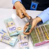 Tín dụng tăng nhanh, ngân hàng đối mặt áp lực nguồn vốn. (Ảnh: Vietnam+)